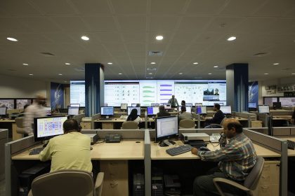 cybersecurity analyst monitoring multiple screens